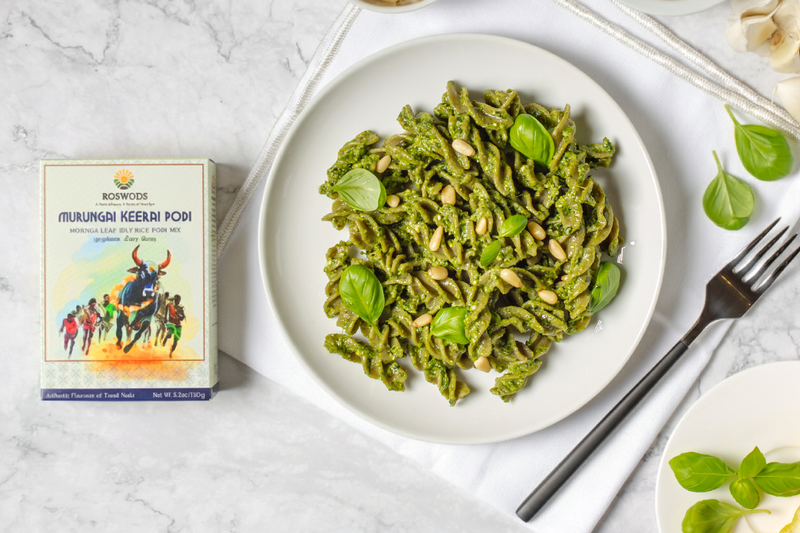Creamy green moringa-spiced pasta served in a bowl